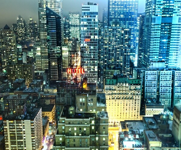 city lights are shown in nyc at night