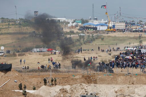 The Latest: Gaza Ministry Says 112 Border Protesters Wounded