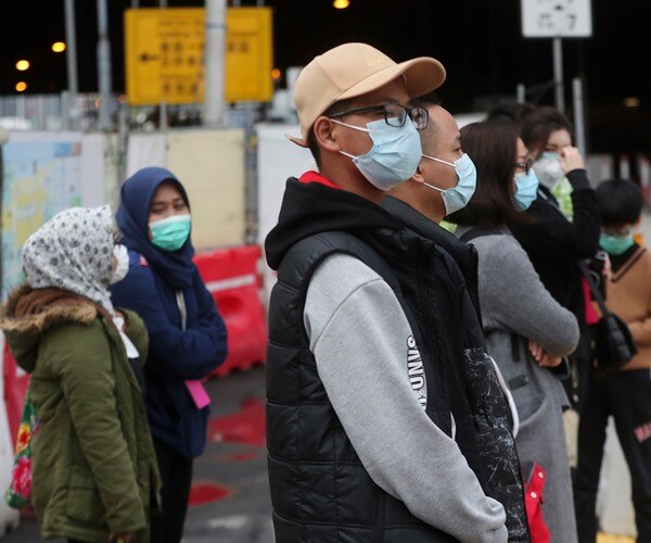 Hong Kong Protesters Torch Planned Quarantine Building