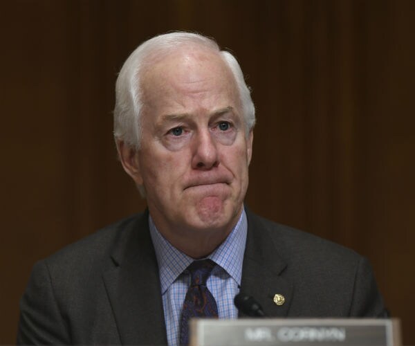 sen. john cornyn listens to testimony on capitol hill in washington