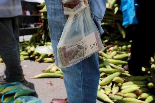 Ham for a Watch: Venezuelans Struggle with Cash Shortages