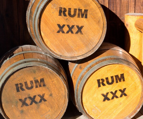 three barrels stamped rum