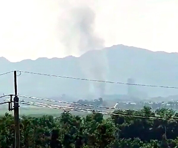 smoke rises after north korea blew up an inter-korean liaison office building near its border with south korea