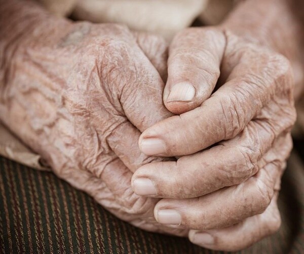 close up of older man's hands