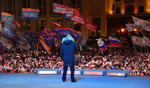 The Latest: Russian Authorities Punish Ballot Stuffing