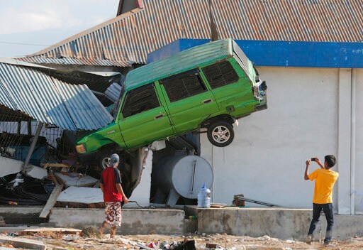 The Latest: Moderate Quakes Shake Another Part of Indonesia