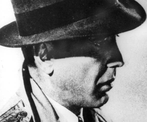 bogart in hat and trenchcoat