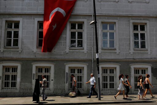 The Latest: Turkey Issues Arrest Warrant for US-based Cleric