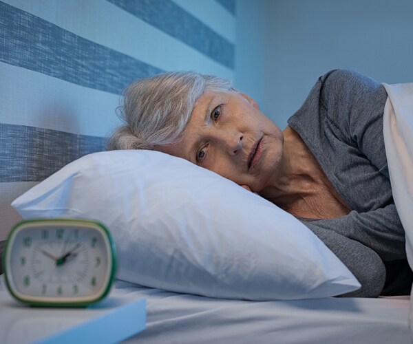 a woman suffering from insomnia