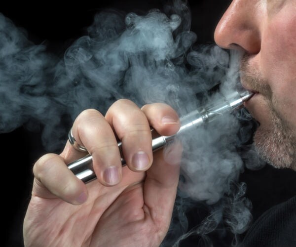 man vaping