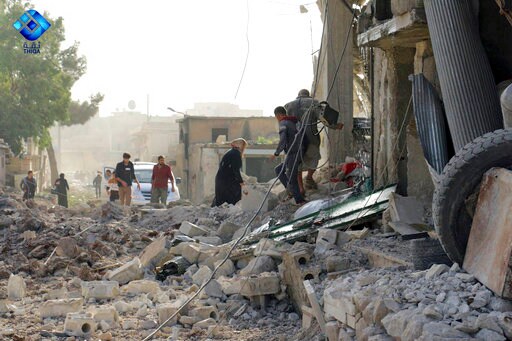 Activists: Airstrike on Rebel-held Syrian Town Kills 21