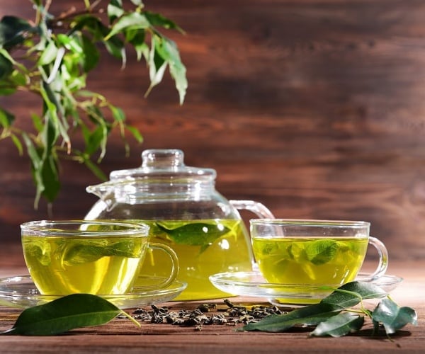 green tea in glass teacups