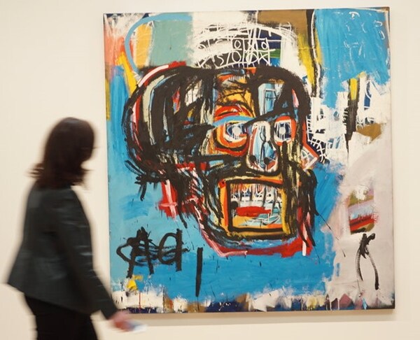 Basquiat Painting Fetches Record $110.5M at New York Auction
