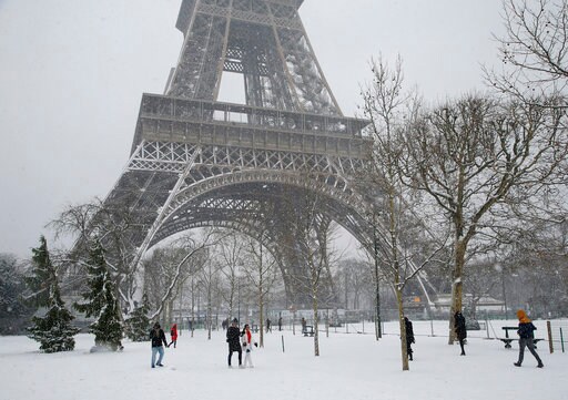 Eiffel Tower Shuts Down as Snow, Freezing Rain Pummel France