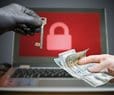 Russia-Linked Group Hacks About 200 Businesses With Ransomware