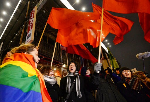Protesters Throw Red Paint at Polish Ruling Party  Building