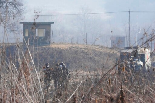 N. Korea Confirms Missile Tests as Kim Visits Munitions site