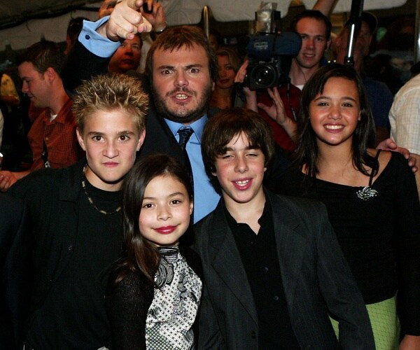 jack black, kevin clark and others pose for photo at movie screening