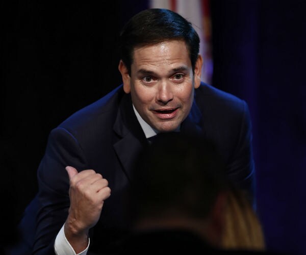 marco rubio speaks during a forum club meeting in florida