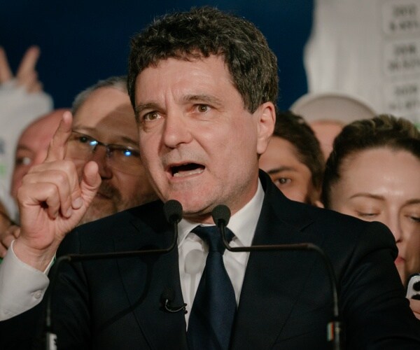 Romanian centrist candidate Nicusor Dan held a lead with 53.68% of the vote in the second round of a...