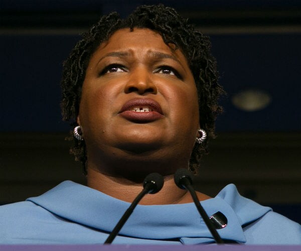stacey abrams speaks during a campaign rally