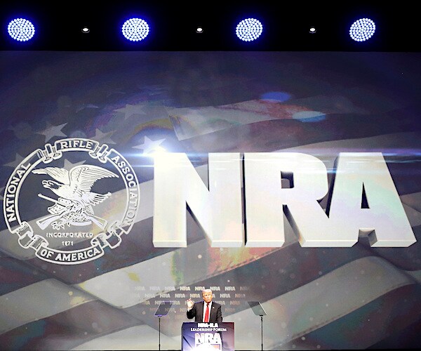 president donald trump delivers a speech during a national rifle association conference