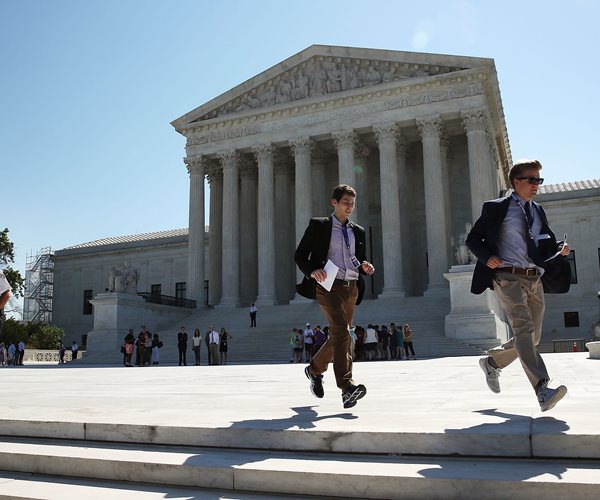 Justices Rap Labor Dept. Over Change in Overtime Pay Rules