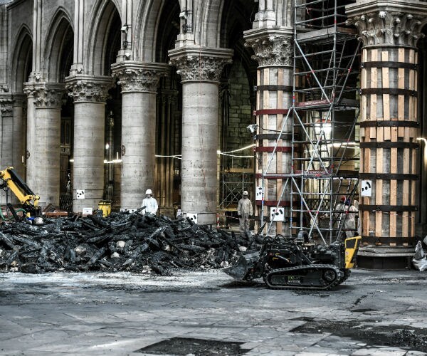 burned structure of the notre dame cathedral is shown three months after the major fire