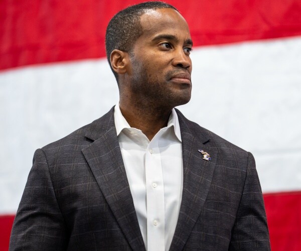 john james looks to the side