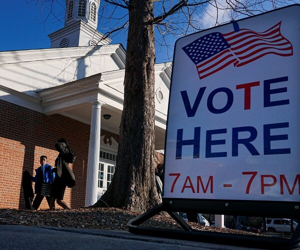 voters enter polling station