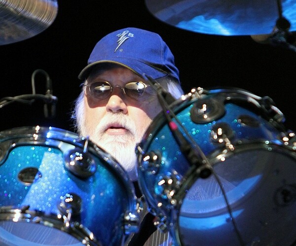 ronnie tutt plays drums onstage