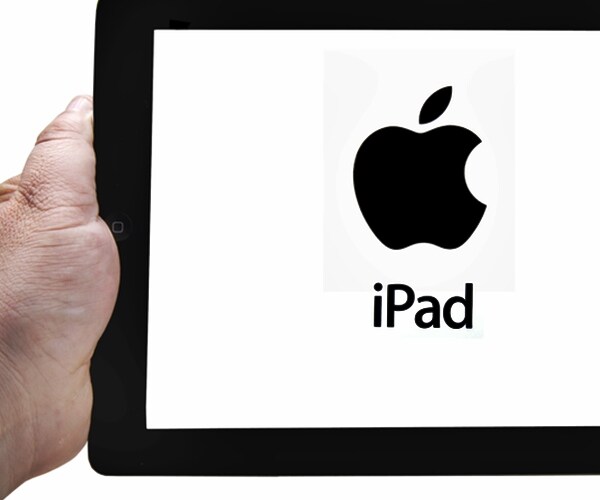 hand holding an apple ipad with logo. 

