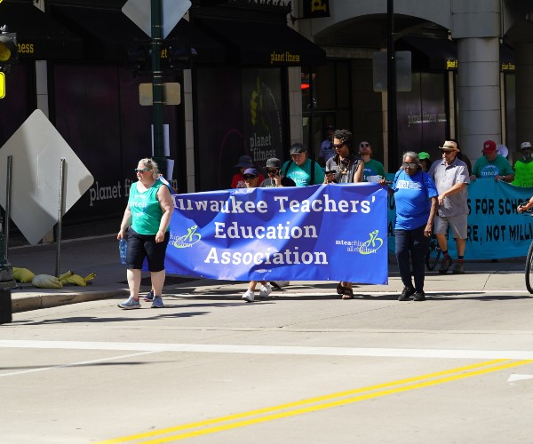labor and teacher unions march or parade 