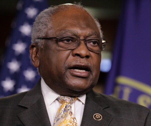james clyburn in a dark gray suit and yellow patterned tie