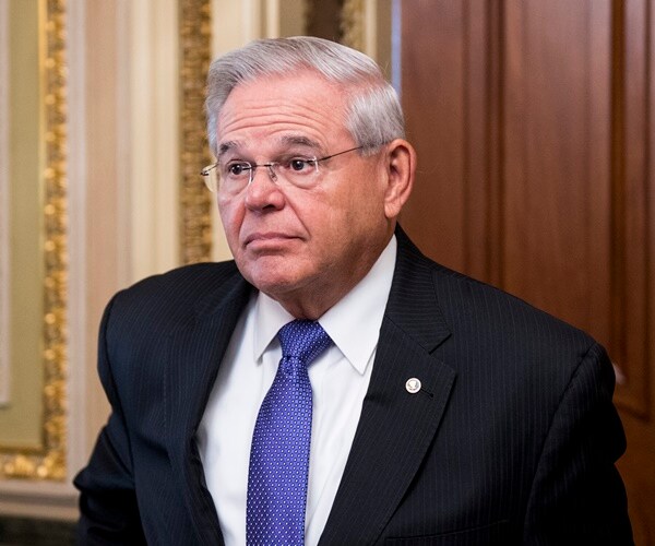 sen. robert menendez leaves an event