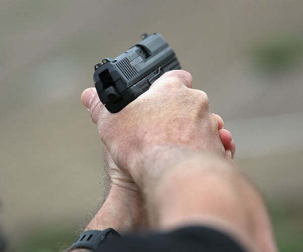 Poll: Americans Want Armed School Guards and Tighter Gun Laws