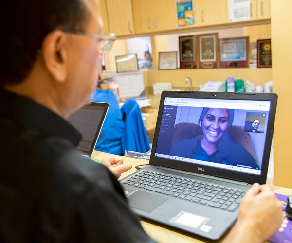 a doctor in florida speaks with a patient on a telemedicine platform
