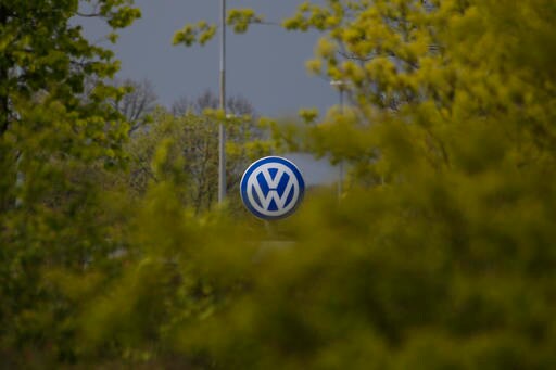 VW Sees Second Quarter Profit Halved after Emissions Scandal