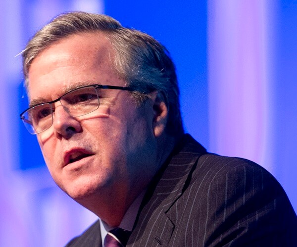 Pro-Bush Group Attacks GOP Rivals, Invokes US Security