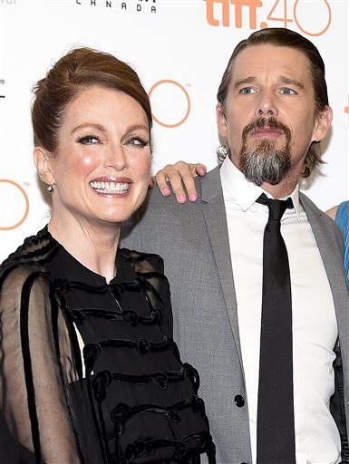 Oscar Winners a Year Ago, Moore and Redmayne Back in Toronto