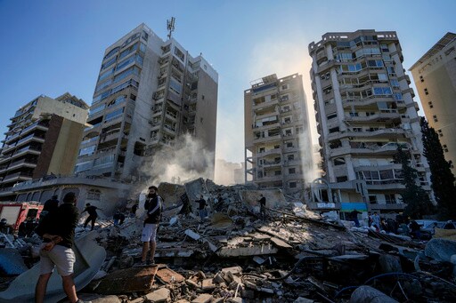 Middle East Latest: Workers Search through Rubble in Eastern Lebanon Where Israeli Strike Killed 13