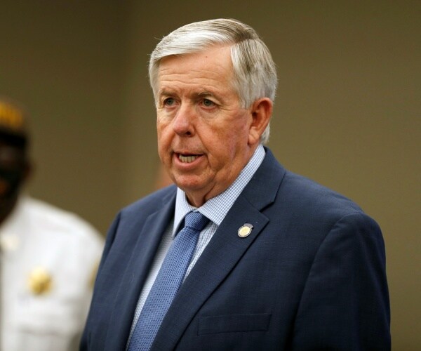 mike parson speaks to press