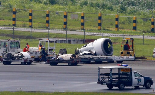 Plane Skids off Rainy Manila Runway, Rips off Engine, Wheel