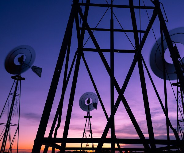 green and traditional energy grid in a rural area of the united states 
