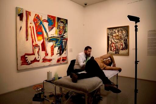 Leading Tattoo Artists Help Wounded Israelis with Scars