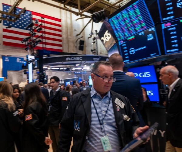 traders work on the floor of the new york stock exchange