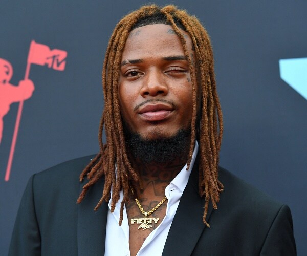 fetty wap stands on red carpet