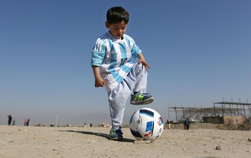 Taliban Threats Force Afghan Boy, Fan of Messi, into Exile