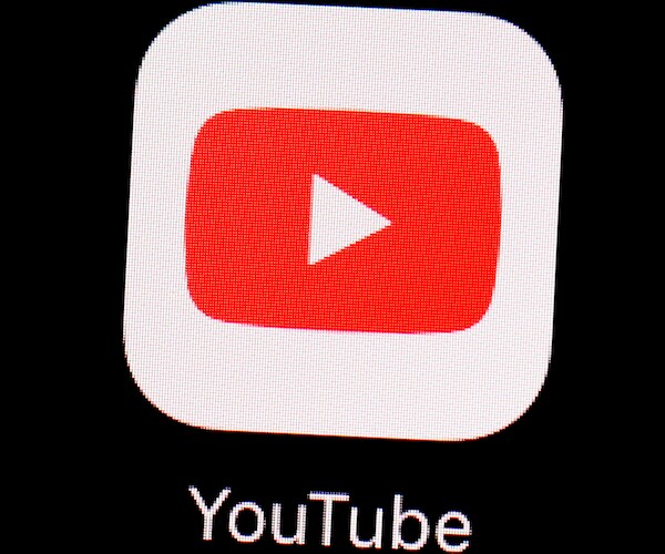 a logo for the youtube application is shown on the screen of a smartphone