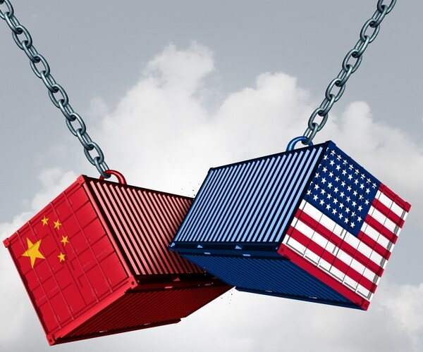 china usa trade war and american tariffs as two opposing cargo freight containers in conflict as an economic dispute

